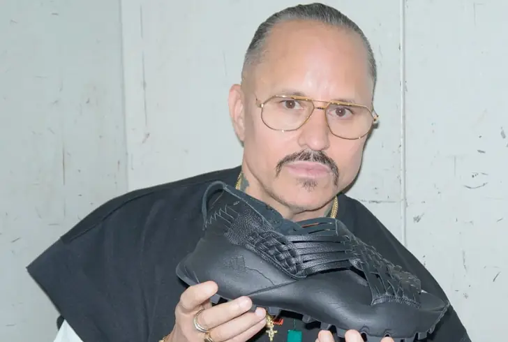 Willy Chavarria holding Adidas Oaxaca Shoe