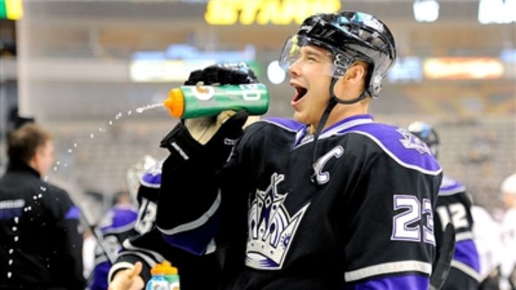 Hockey player drinks from wrong end of bottle