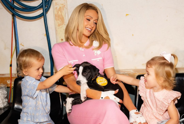 Paris Hilton with children learning
