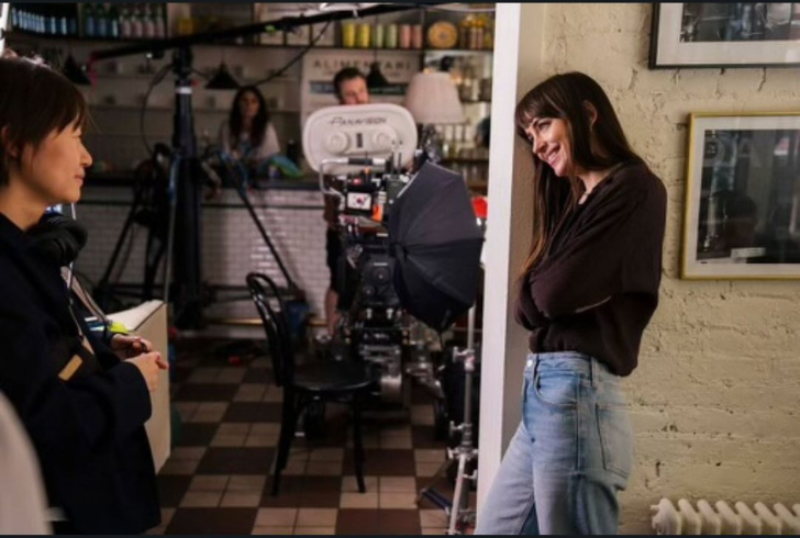Dakota Johnson posing with calm smile