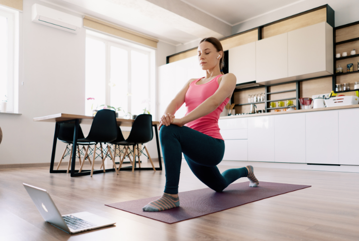 Woman exercising at home